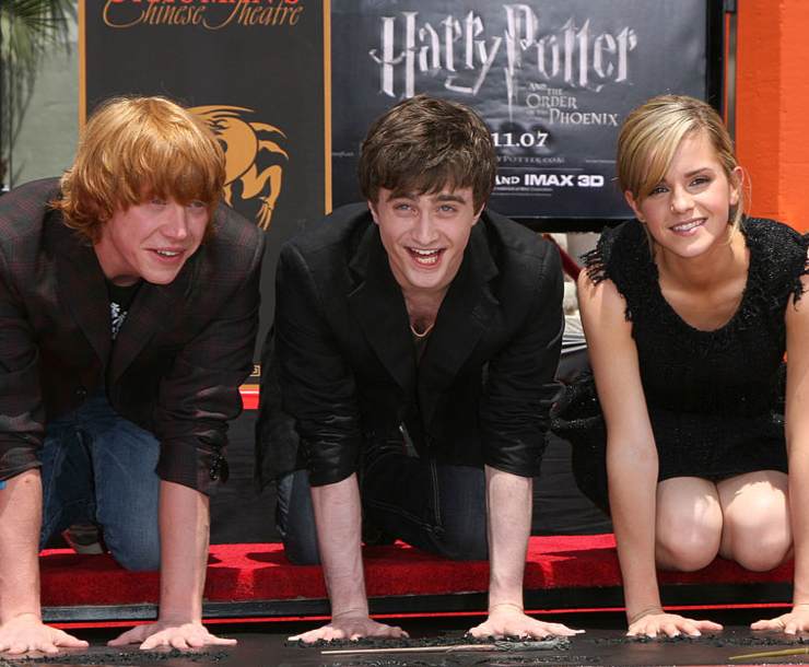 Da sinistra: Rupert Grint, Daniel Radcliffe ed Emma Watson in Harry Potter - Fonte: Getty Images